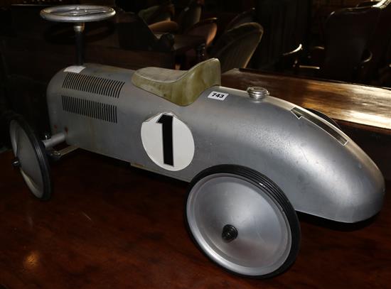 Ride-on childs racing car